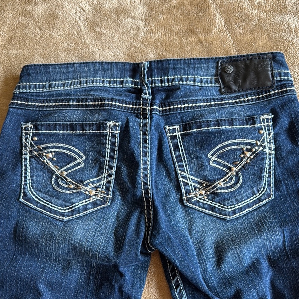 Silver Jeans Blue Boot Cut Denim with Signature Stitching